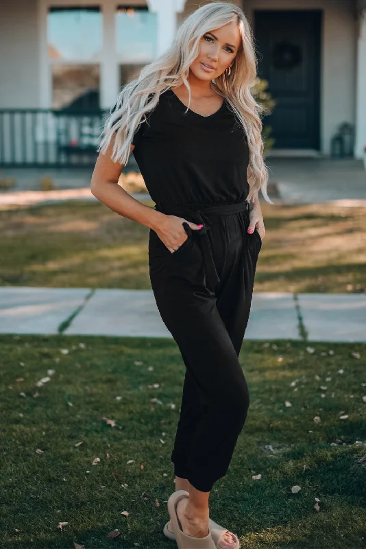Belted V-Neck Jogger Jumpsuit Button-up jumpsuit, Vintage style, Casual, Relaxed