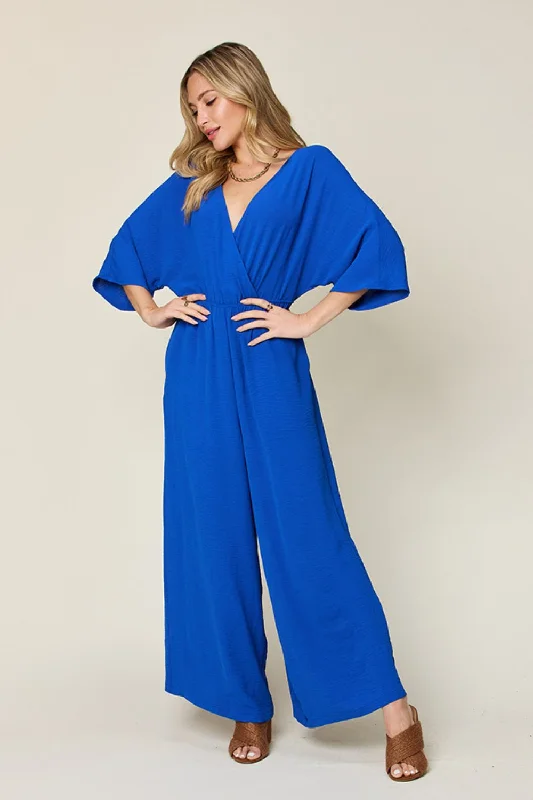 Surplice Wide Leg Jumpsuit with Pockets Blazer jumpsuit, Formal wear, Business chic, Sleek